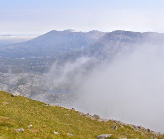 On the way up Ben Stack, cloud lifting over Foinaven and Arkle On the way up Ben Stack, cloud lifting over Foinaven and Arkle