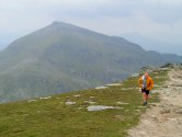 The windy summit of Stob Binnein with Ben More behind