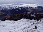 Running up Beinn Each with Benvane behind