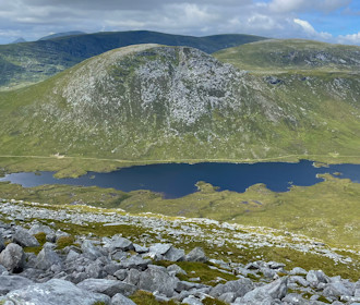 Descending to Loch an t-Seilg, Meall a' Chleirich ahead Descending to Loch an t-Seilg, Meall a' Chleirich ahead